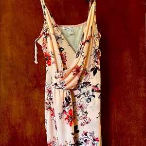 Never worn Venus Summer Dress. Size Med. Length below the knee. Pale pink floral